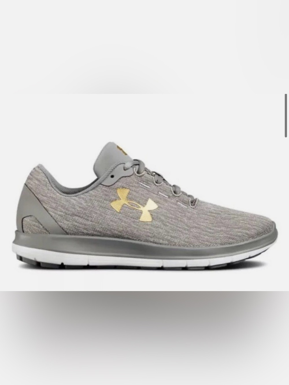 Under Armor Remix women’s size 8 gray with gold logos sneakers shoes.